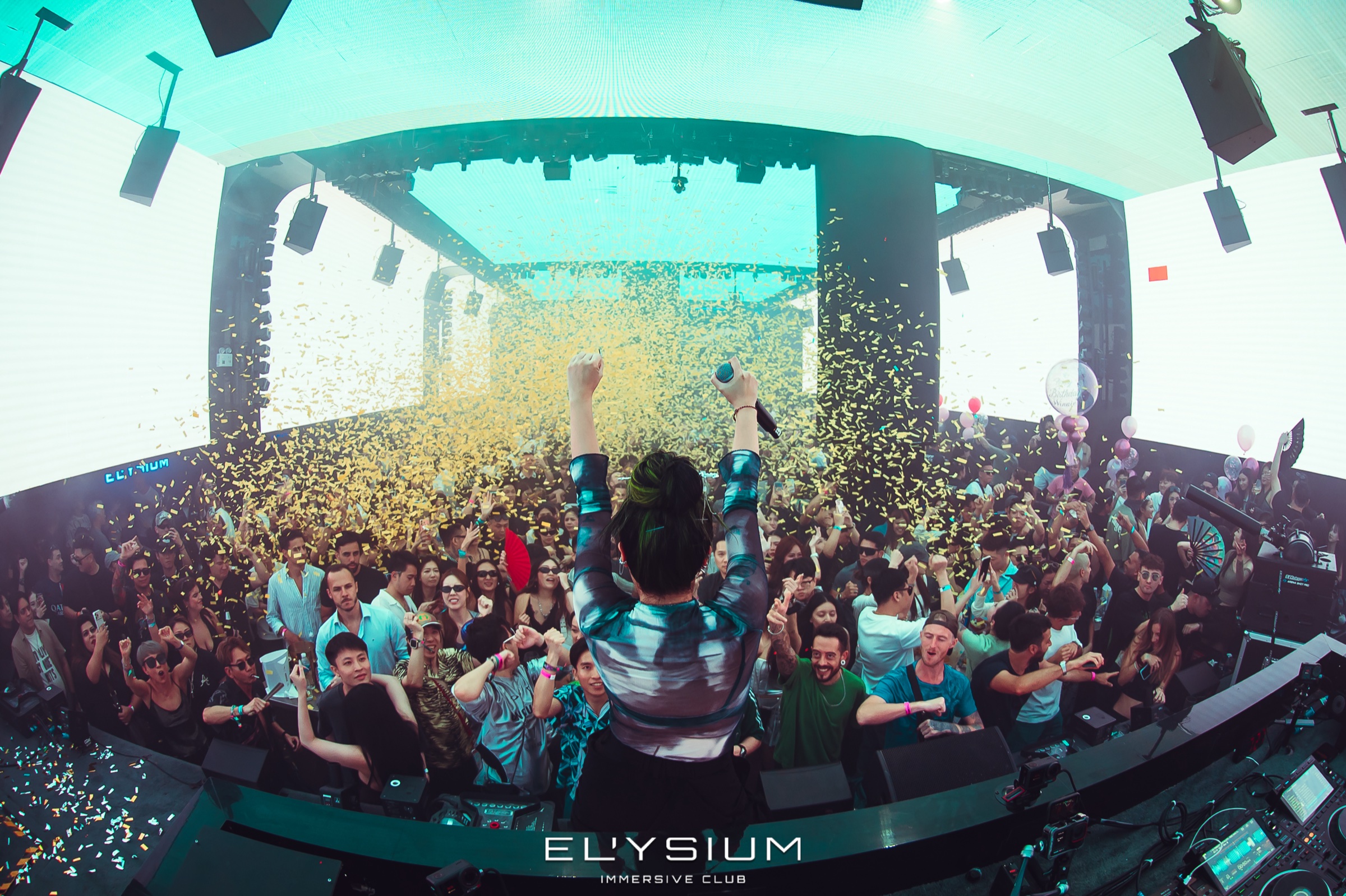 DJ performing with confetti at Elysium Bangkok